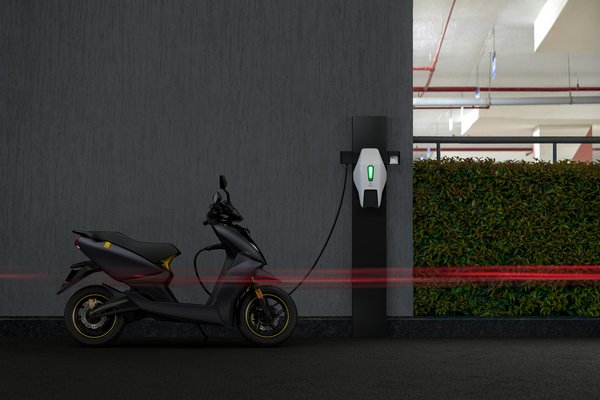How to set up a UK-based electric scooter sharing service and comply with transportation and safety laws?